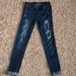 Butt lifting blue jeans